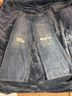 Levis and Strauss -Women’s Distressed wide bottom denim size 31