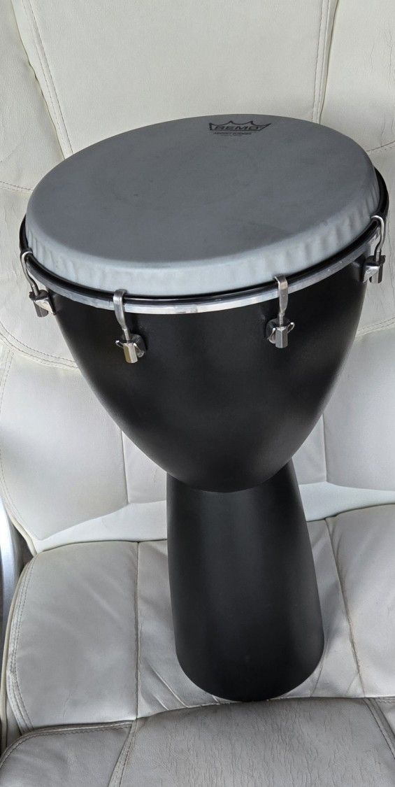 Remo Djembe Drum. Excellent.  Weatherproof 