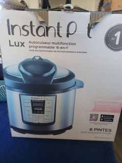 Never used Instant Pot Lux 6-in -1 pressure cooker
