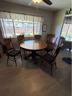 Solid oak table and chairs
