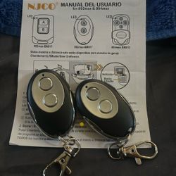 Wireless keychain garage door openers