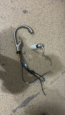 Faucet and soap dispenser