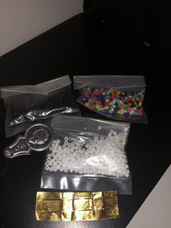 3 bags of beads, 2 sewing needles, 1 threader lot sale