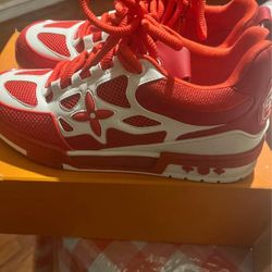 Red and white Louis Vuitton sneakers