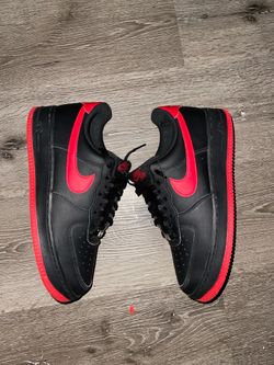 Black and red Air Force 1s