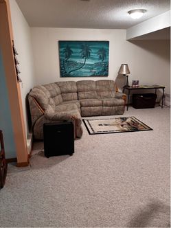 Sectional Sofa /recliner at each end