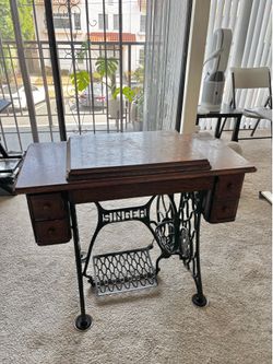 Antique Singer Sewing Machine in Oak Fold-Down Cabinet