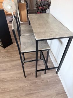 Bar height table with 2 chairs