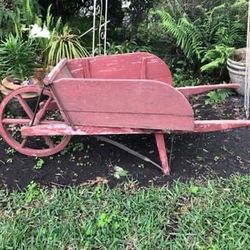 Antique wood wheelbarrow