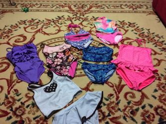 7/8 girls bathing suits. Pet free smoke free home.