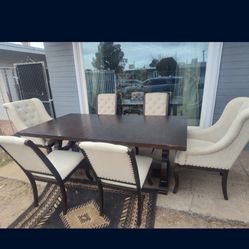 Dining table and 6 chairs