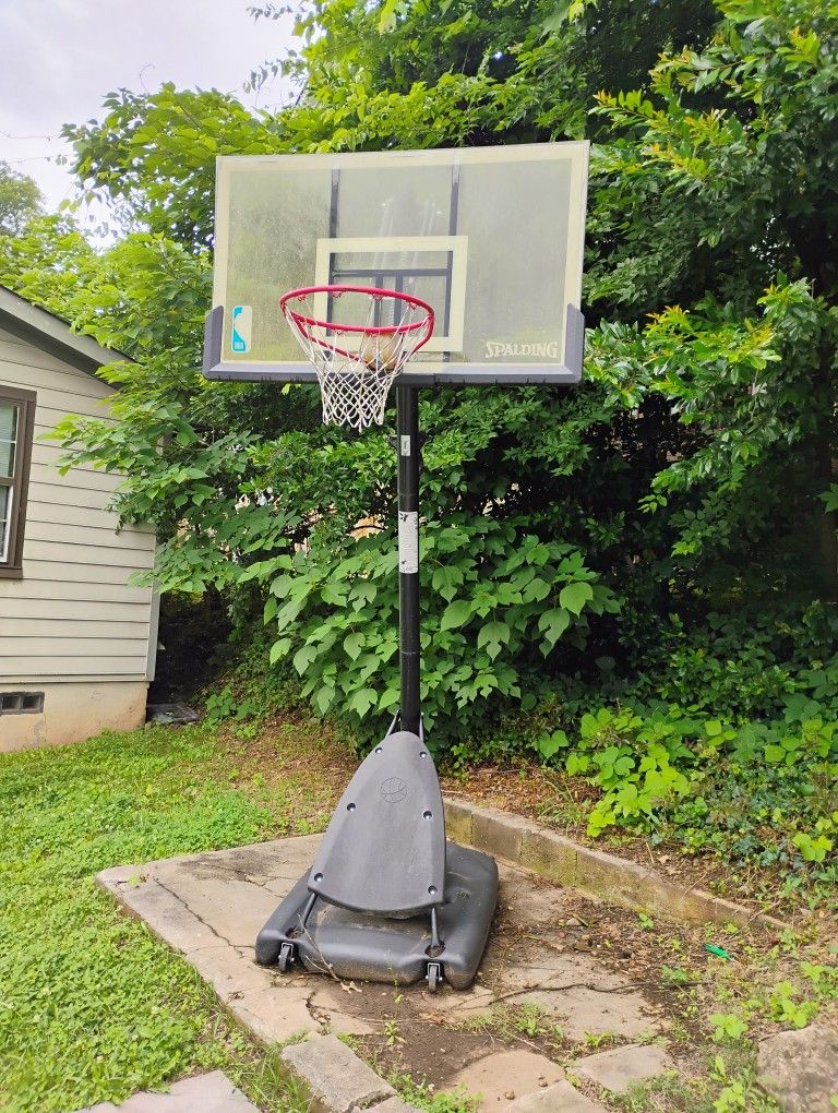 Spalding 54-Inch Portable Basketball Hoop with Shatter-Proof Polycarbonate Backboard