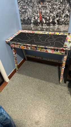 Desk With Skateboarding Stickers