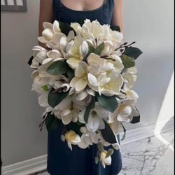 Gorgeous handmade faux cascading magnolia bouquet for bride and wedding