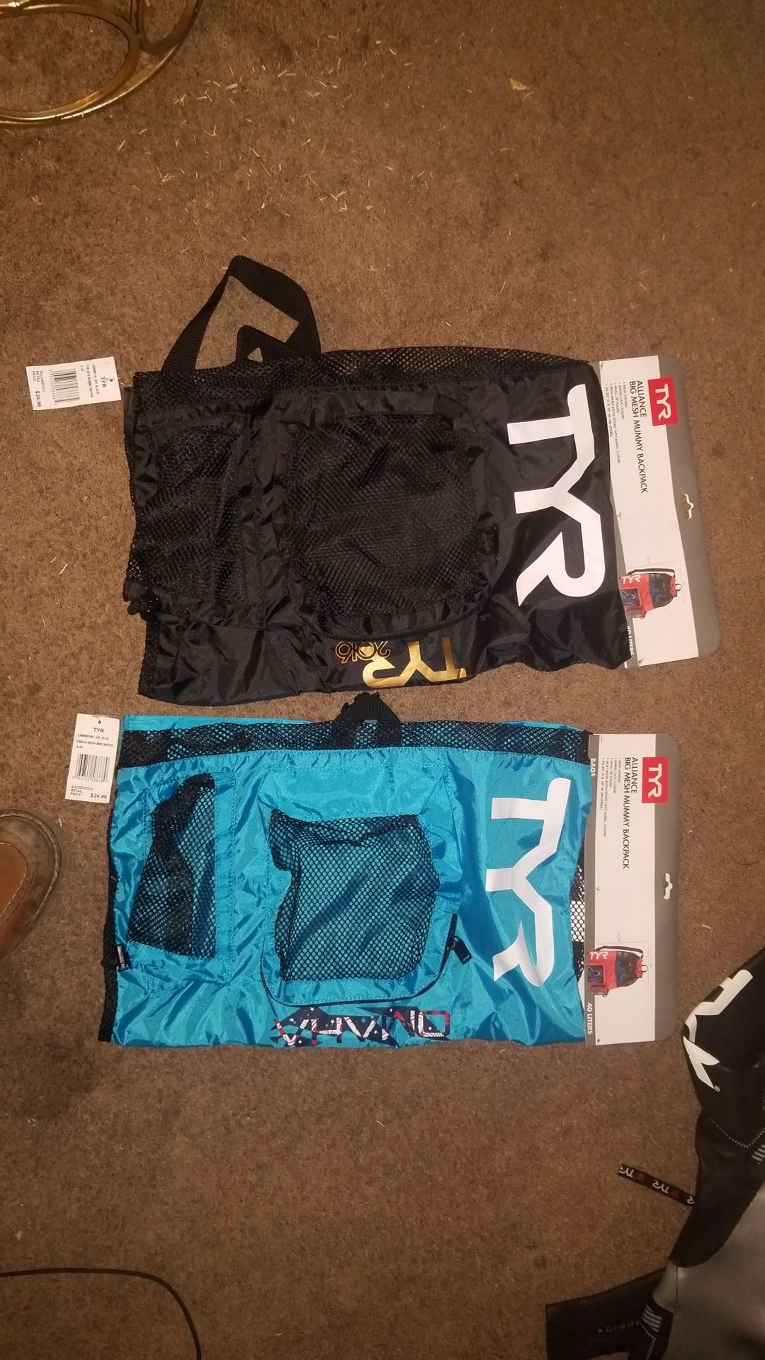 TYR! 2 NEW TYR MESH BACKPACKS. TAGS STILL ON THEM. ONE BLACK ONE BLUE ASKING $15 EACH OR BEST OFFER!