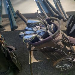 Yard golf sale, clubs ,bags pull carts, putters, drivers, wedges ect