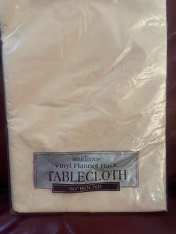 HomeTrends 60” Round Vinyl Flannel Back Tablecloth Ivory Waterproof Wipe Clean
