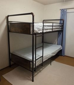 Bunk bed with mattresses