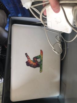 2 Mac book laptops