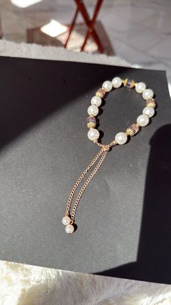 Handmade white faux pearls and purple crystals bracelet