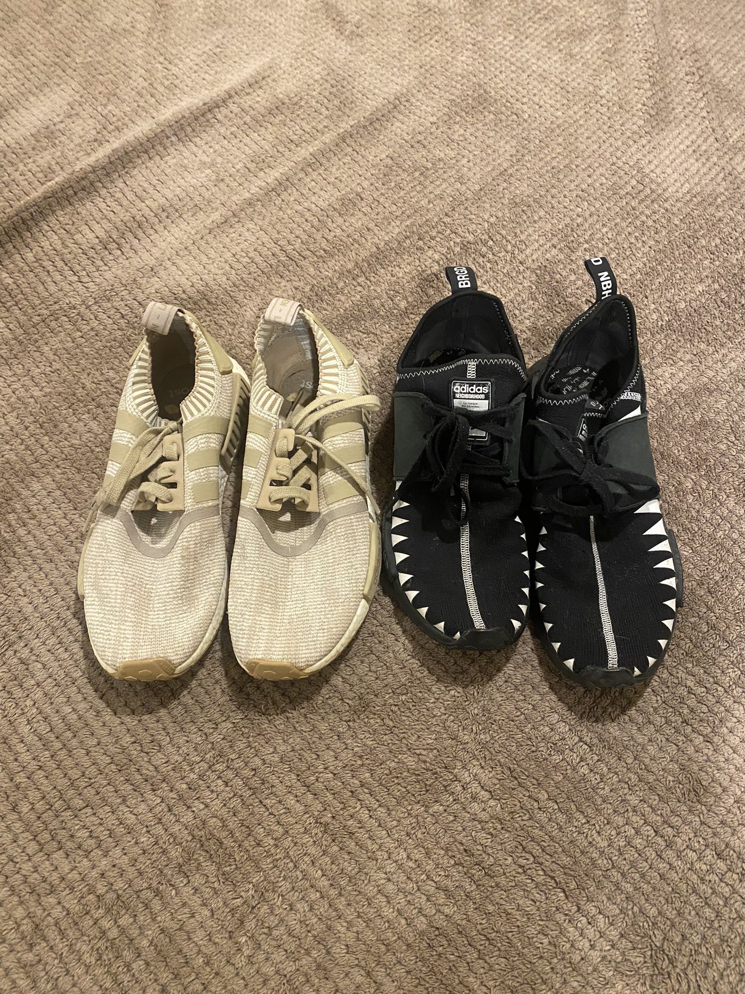 2 Pairs Of NMD Adidas Sneakers