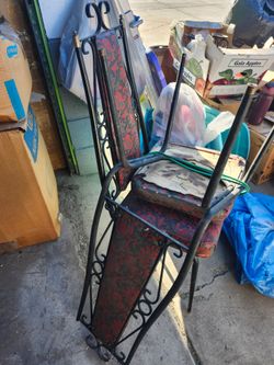 Mid century meta/l rought iron chairs