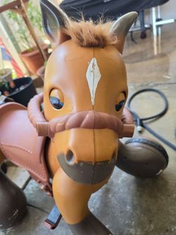 Kid Trax 12-Volt Rideamals Scout Pony Interactive Ride-On Toy