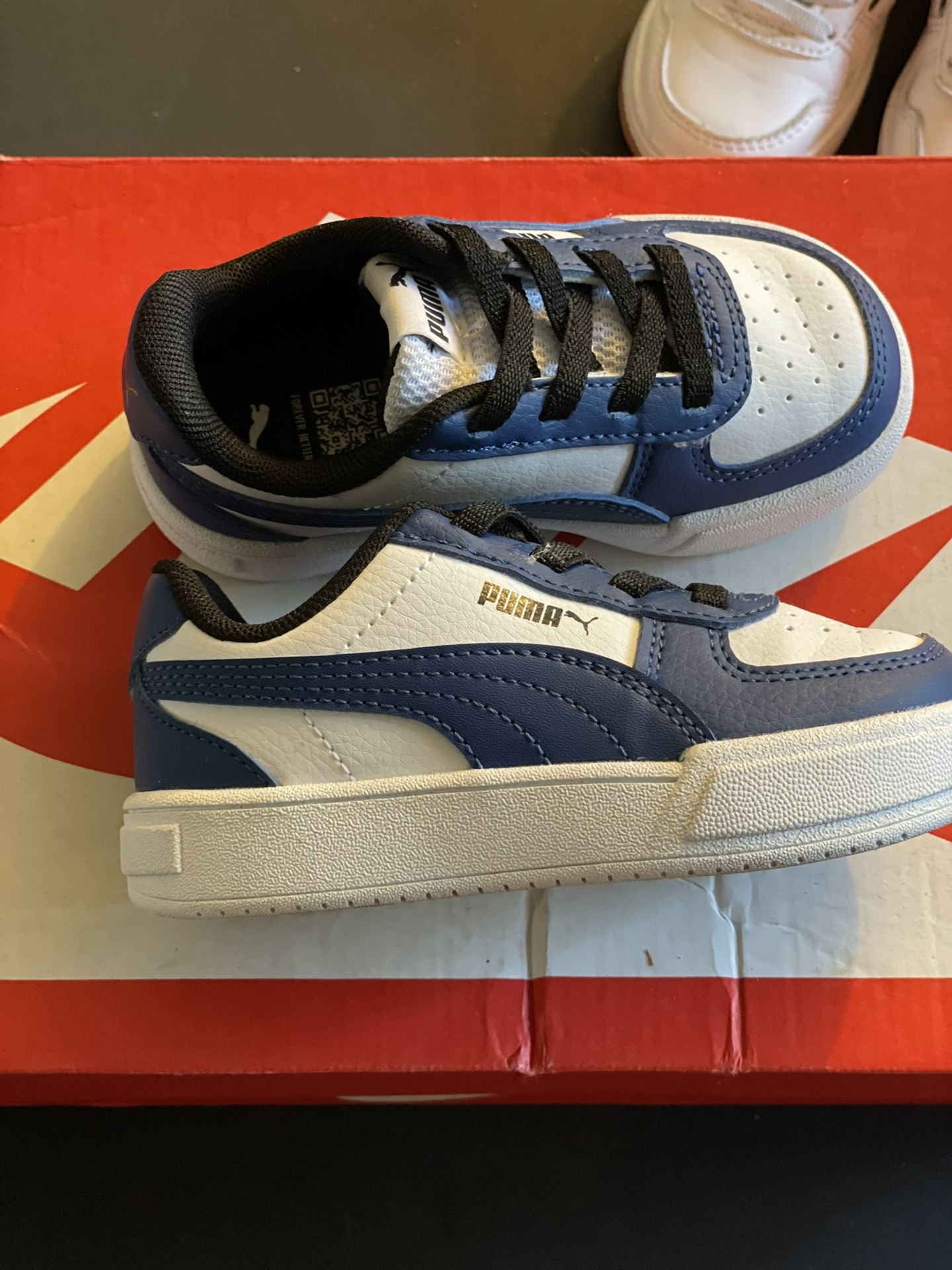 Toddler White, Blue, & Black Pumas Size 6c $30