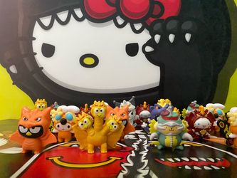 McDonalds Hello Kitty Godzilla collab happy meal toy figures