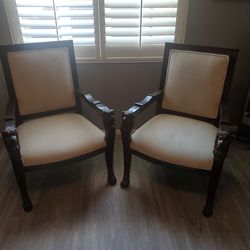 2 lion arm chairs