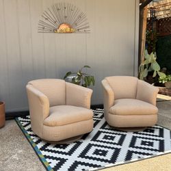 Pair of Vintage Mid Century Swivel and Rocking Club Chairs .