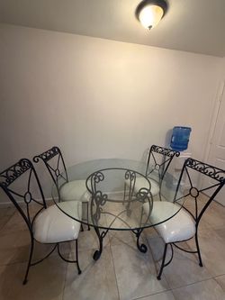 4 chair glass dinning table