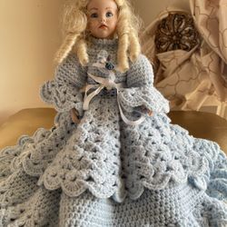 Beautiful, gorgeous doll porcelain with handmade dress