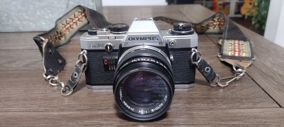 Olympus OM-10 35mm SLR Film Camera with 50 mm lens Kit