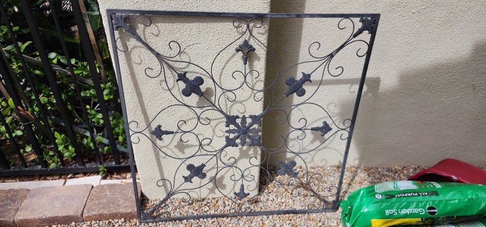 Large Metal Decor Piece 39" by 39".  Lighter weight great as an interior or exterior decor piece.

