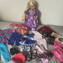 Doll With Lots Of Clothing 