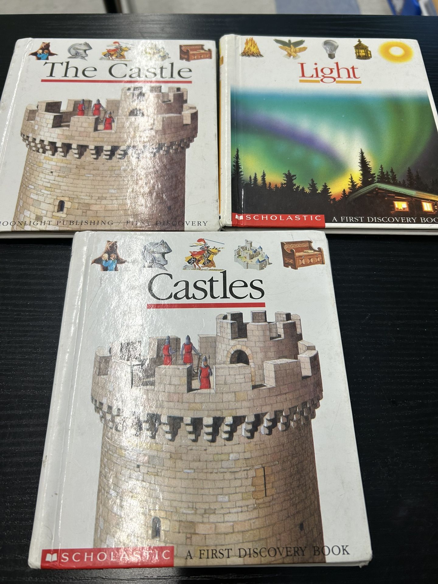 Set of 3 children's books: The Castle, Castles, and Light