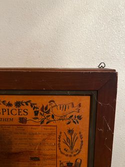 Wood spice and herb rack with the glass bottles