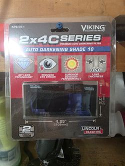 Auto darkening welding lens