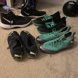 Puma Soccer Cleats And Pair Of Basketball Shoes