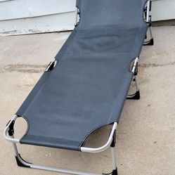 Lounge chair. Camping cot