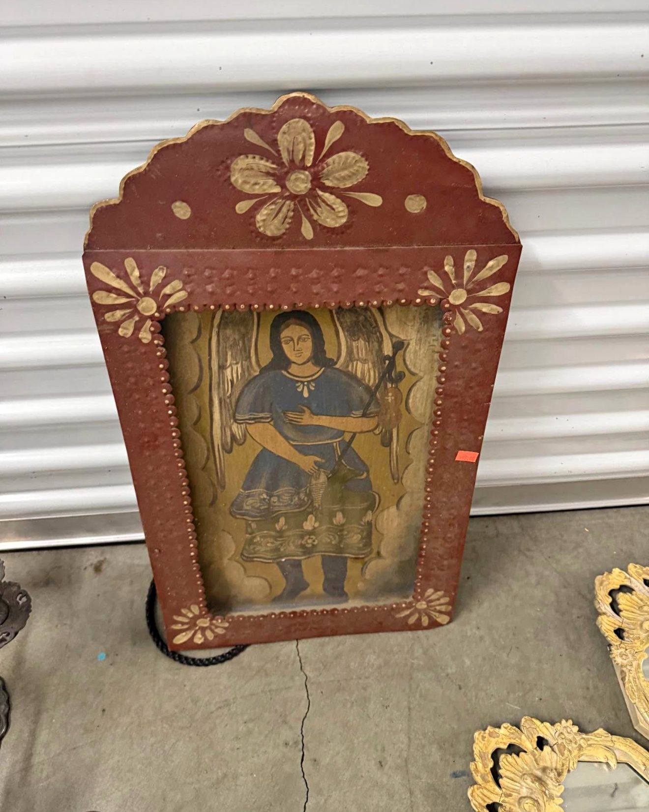hand-painted retablo of an angel.