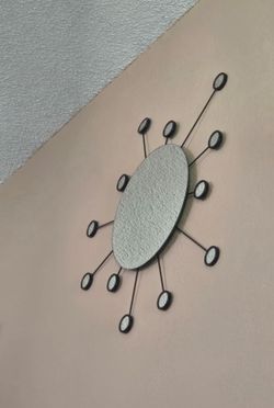 Vintage IKEA Figgjo sunburst wall mirror from the 1990s