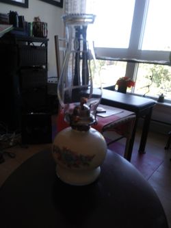 Milk glass hurricane lamp with flowers