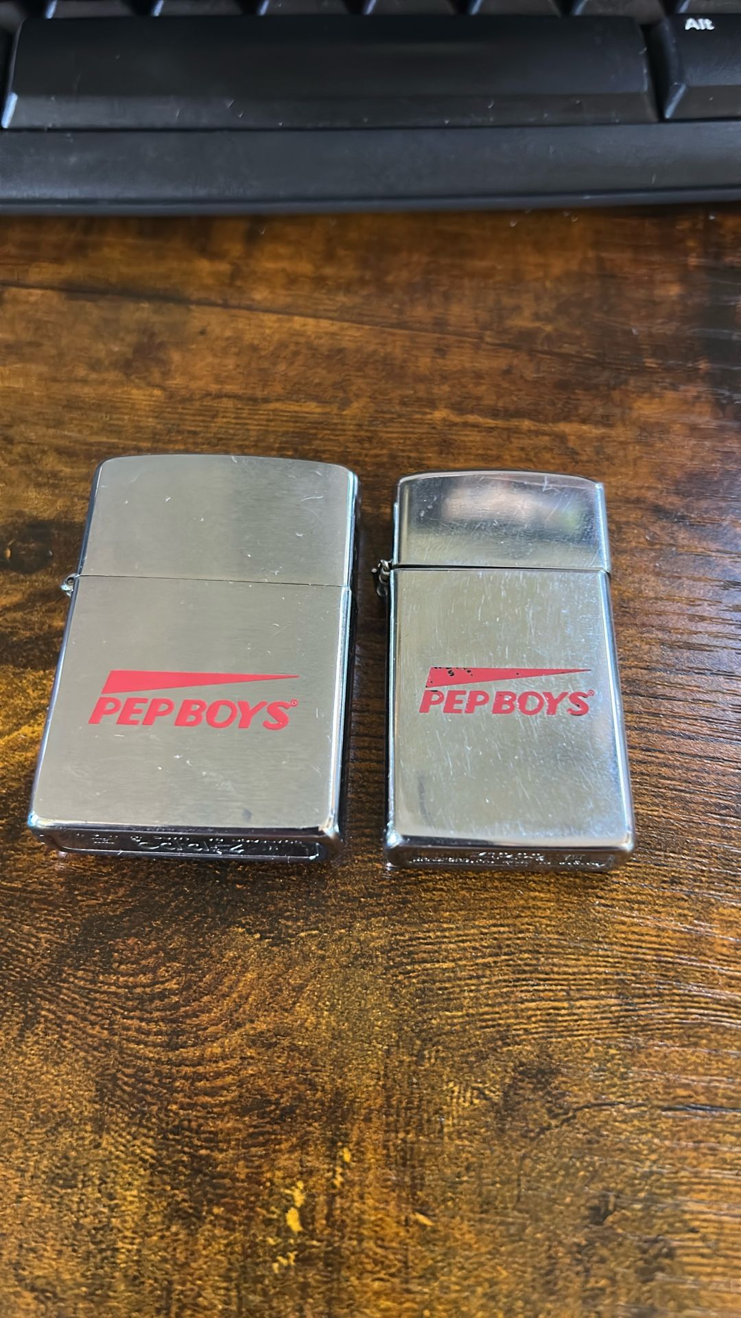 Two Early 90’s Pep Boys Zippo