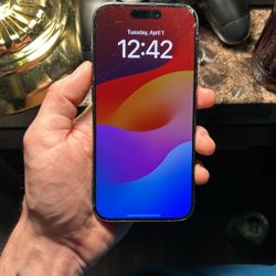 AT&T Locked iPhone 15 pro, cracked but fully functional.