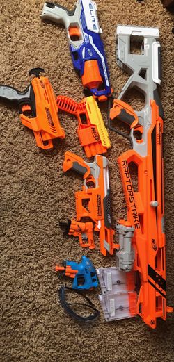 7 Nerf Guns, with eye protection.