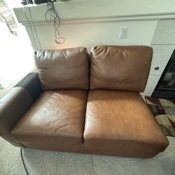 Leather Love Seat For ($20)