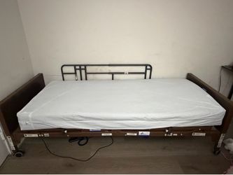 Hospital bed with rails, electric