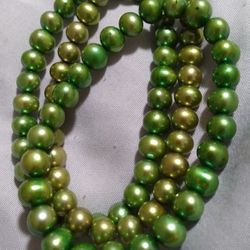 Three Green Pearl Bracelets.  7 Inch Stretch.